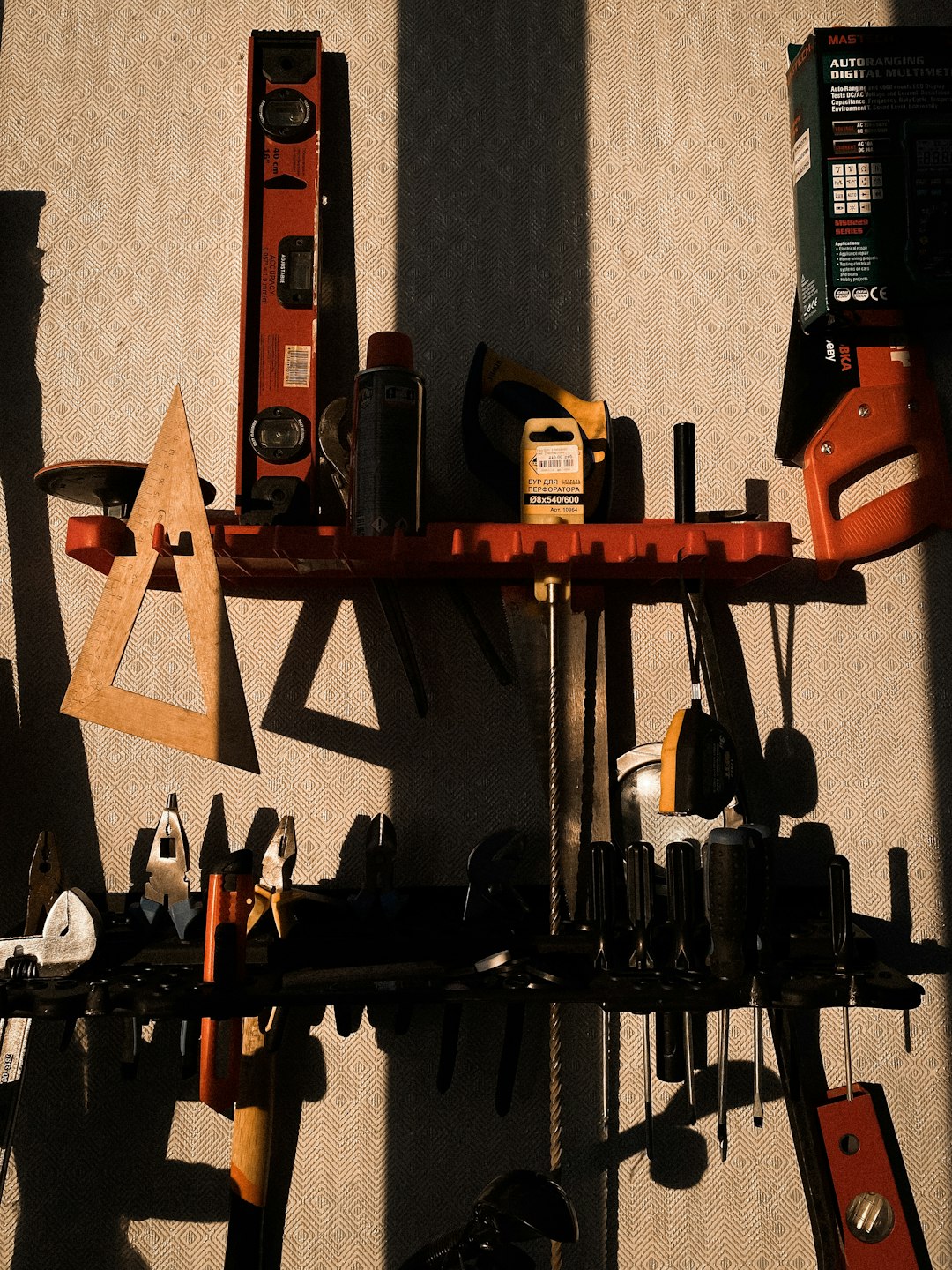 assorted-color-power-tools-on-wall-rthox-cst-q